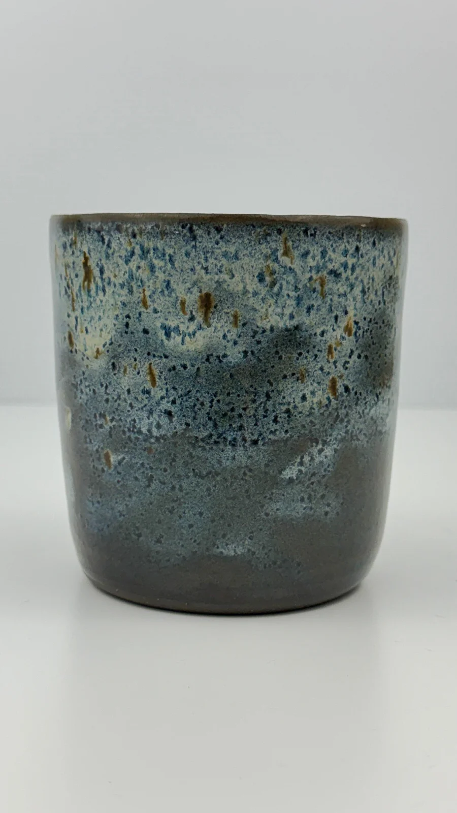 mtvessell_pottery_azure_3-4 Side view of a handcrafted ceramic vessel from mtvessell Pottery's Azure collection