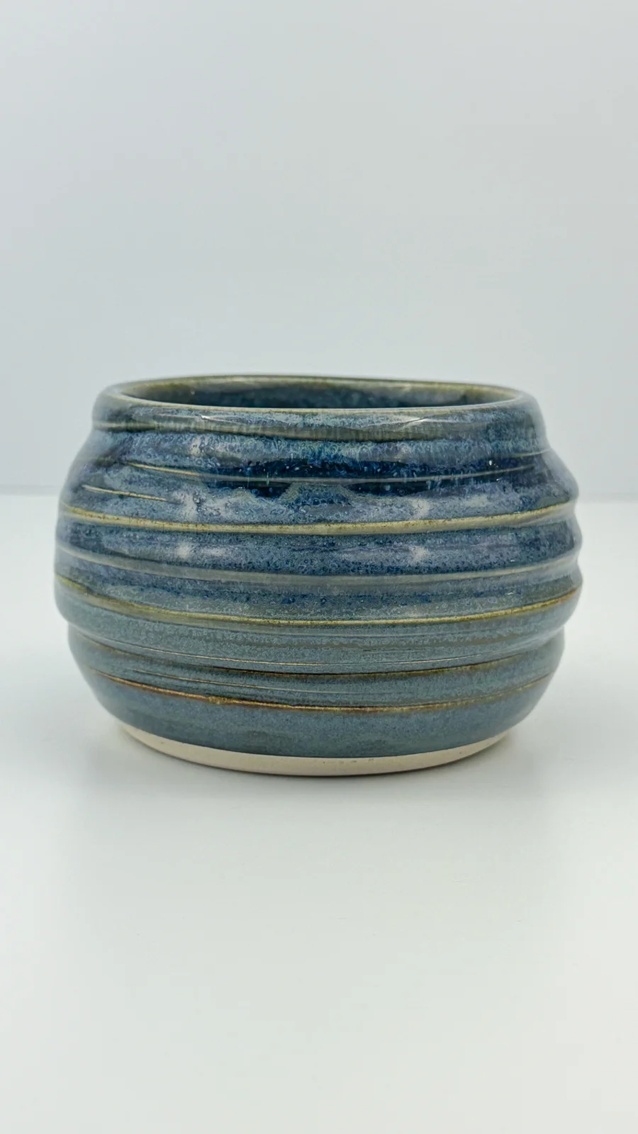 mtvessell_pottery_azure_5-4 Side view of a handcrafted ceramic vessel from mtvessell Pottery's Azure collection